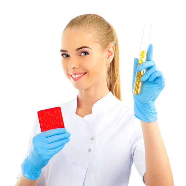 Doctor giving a pill. Hand with pill on foreground — Stock Photo, Image