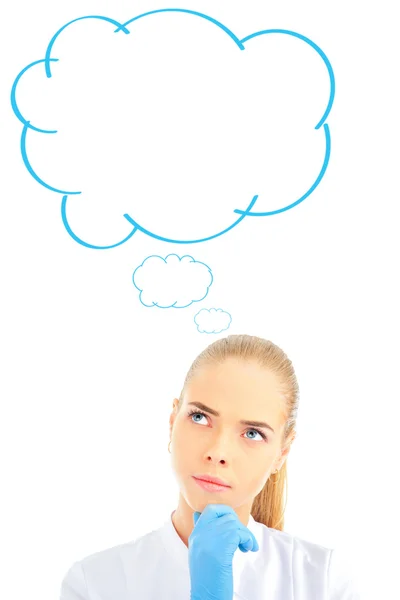 Thinking medical doctor, thinking and looking up seriously. Blank cloud balloon overhead — Stock Photo, Image