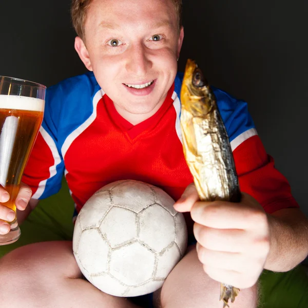 Closeup portrait of young man wearing sportswear fan of football — Stock Photo, Image