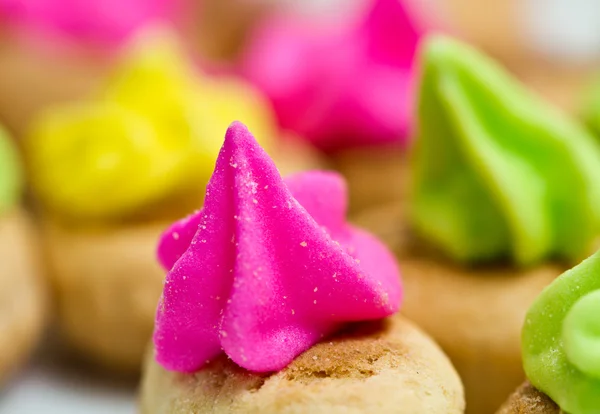 Pink Icing Topped Cookies Background II — Stock Photo, Image