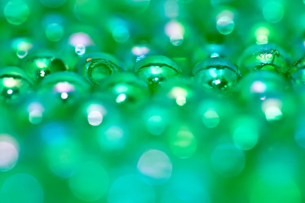 绿色的珠子背景 v — 图库照片
