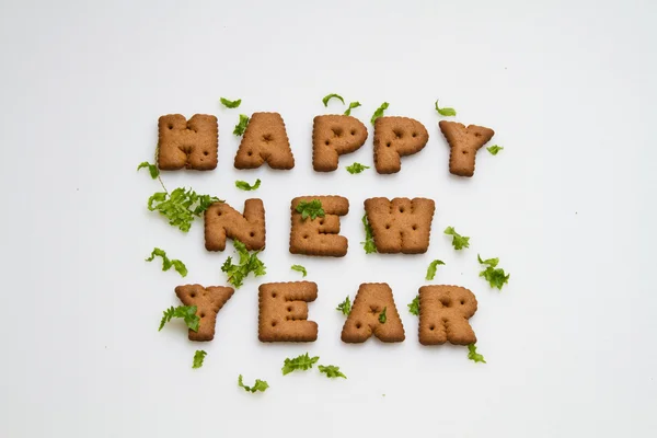 Happy New Year Biscuits And Leaves — Stock Photo, Image