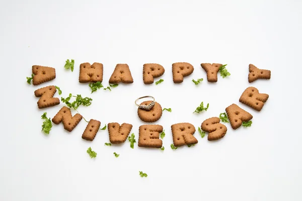 Aniversário - Biscoitos, folhas e anel — Fotografia de Stock