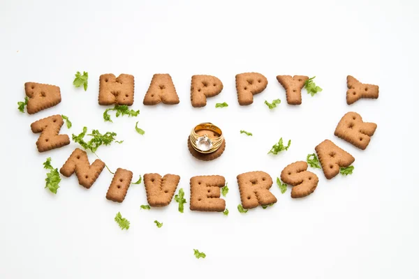 Anniversary - Biscuits, Leaves and Diamond Ring II — Stock Photo, Image
