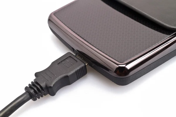 Harddisk e cabo USB Fechar — Fotografia de Stock