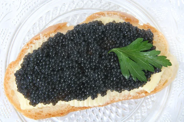 stock image Black caviar sandwich