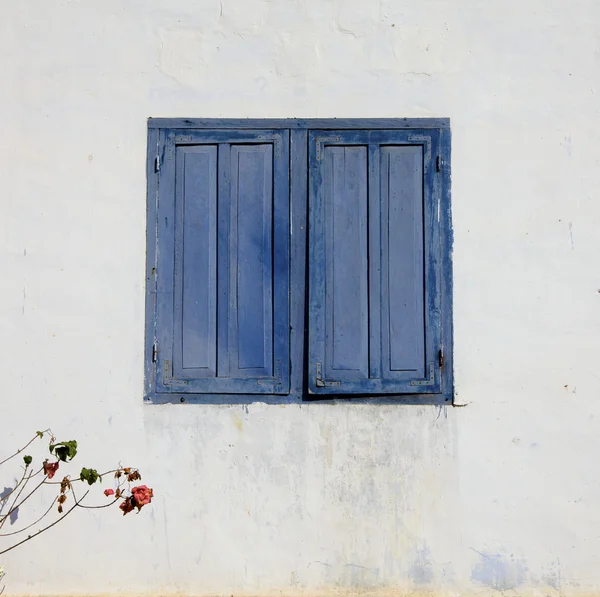 stock image Blue Shutter Window on White Stucco Wall