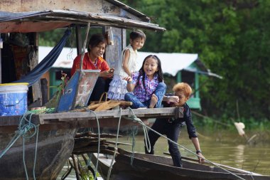 Cambodian Children on Houseboat clipart