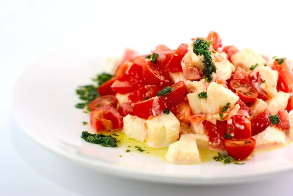 stock image Salad with fresh tomatos, mozarella and basil