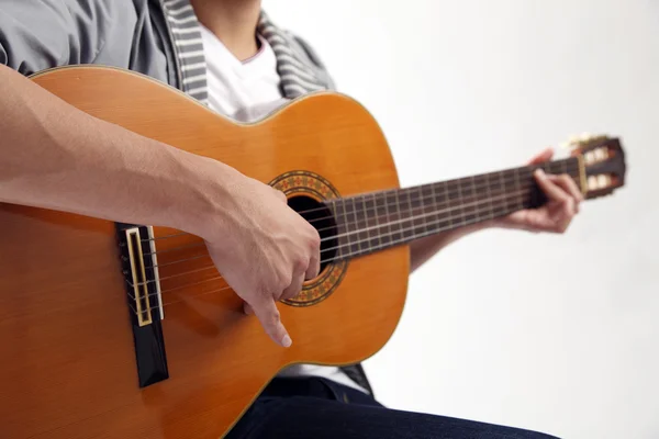 stock image Crop image of the man holding a guitar