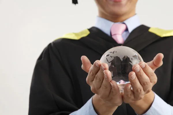Mid section of the man holding glass globe — Stock Photo, Image
