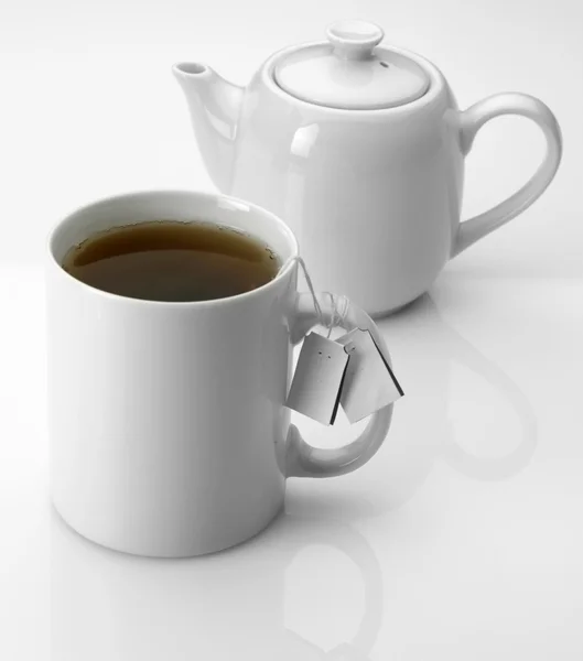 Kubek i herbaty garnek — Zdjęcie stockowe