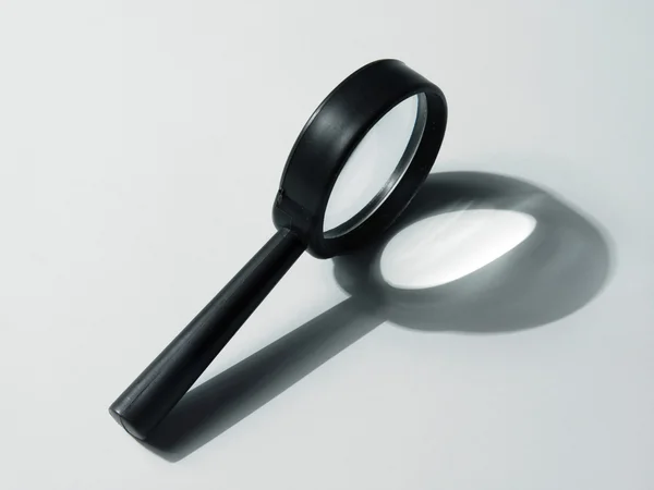 Small magnifying glass — Stock Photo, Image