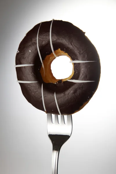 Donut no garfo — Fotografia de Stock