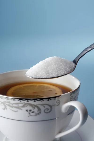 stock image Adding sugar