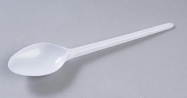 Plastic spoon — Stock Photo, Image