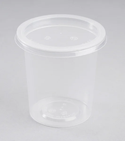 Круглый пластиковый контейнер — стоковое фото