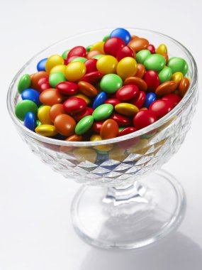 Multi color of cup coated chocolate clipart