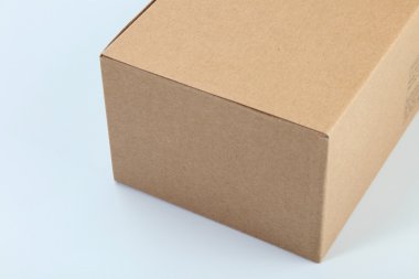 Close up brown cardboard box on the plain background clipart