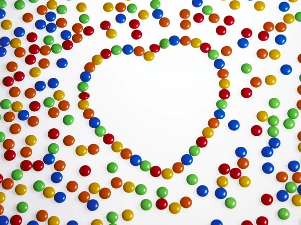 Multi color of coated chocolate in the heart shape — Stock Photo, Image