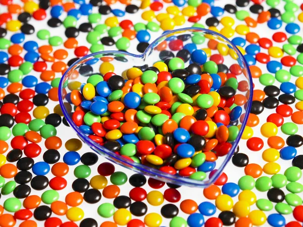 Multi color of coated chocolate on the plate — Stock Photo, Image