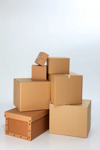 Grupp av dirfferene storlek lådor tillsammans — Stockfoto