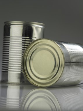 Few aluminium cans with reflection clipart