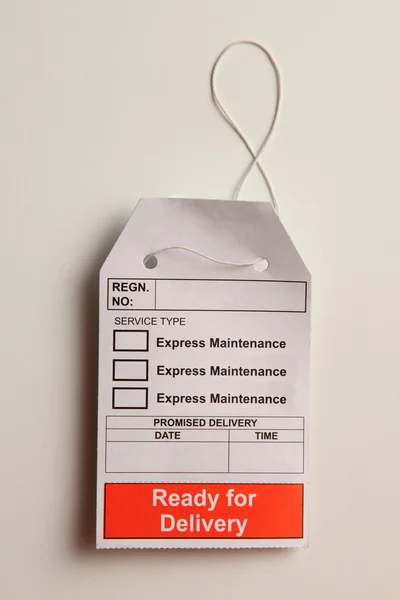 Express maintance tag on the plain background — Stock Photo, Image