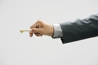 Man using a key clipart