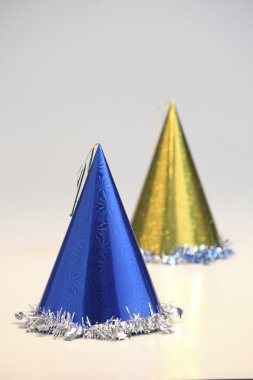 Two party hats on the white background clipart