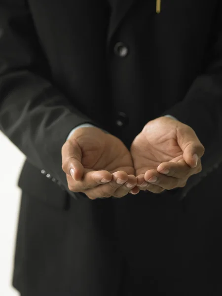 stock image Businessman cupped hands.