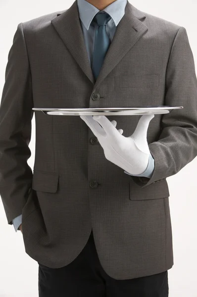 Sale person holding a tray — Stock Photo, Image