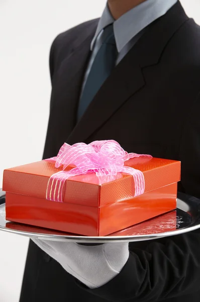 Man holding a present — Stock Photo, Image