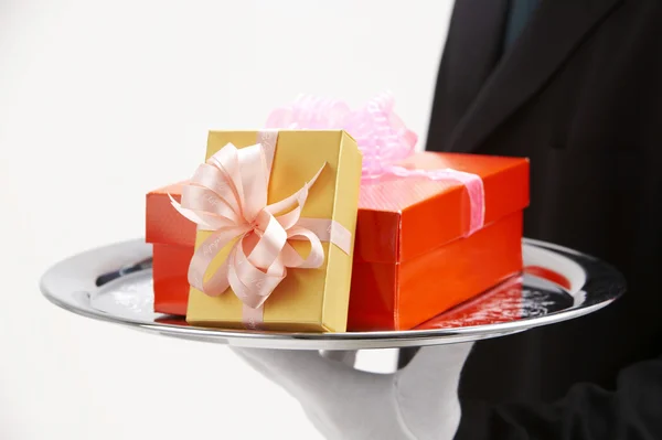 Man holding exclusive presents — Stock Photo, Image