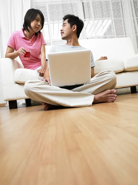 Couple is surfing the internet together. — Stock Photo, Image