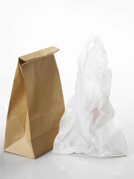 Paper bag and plastic bag — Stock Photo, Image