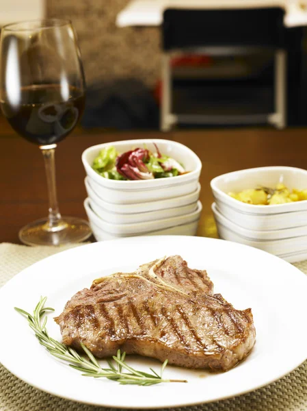 stock image String steak and red wine
