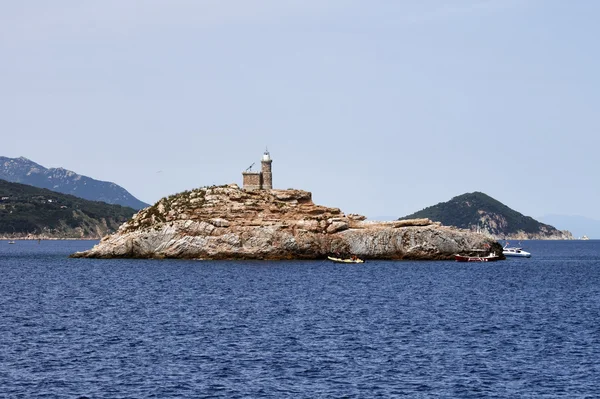 Italy, Elba Island, rock with a lighthouse near Portoferraio — Stock Photo, Image