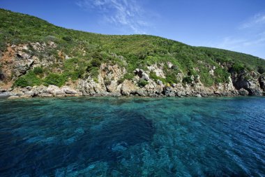 Italy, Tuscany, Elba Island, view of the rocky coastline clipart