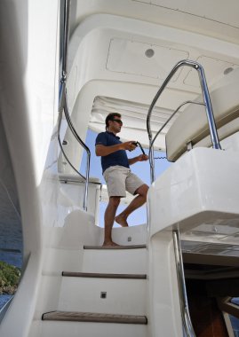 Italy, luxury yacht Azimut 75', stairway to the flybridge clipart