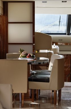 Italy, luxury yacht Azimut 75, dinette and dining table clipart