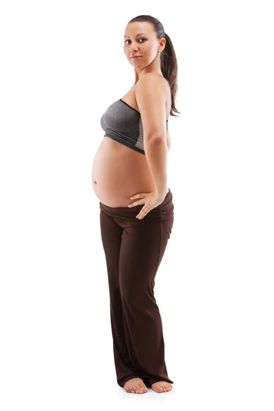 Bella donna incinta che fa esercizi — Foto Stock