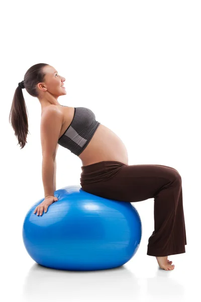 Schwangere macht Übungen — Stockfoto