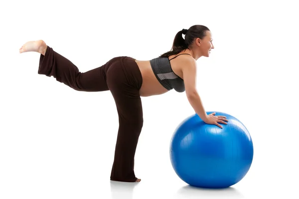 Mujer embarazada haciendo ejercicios —  Fotos de Stock