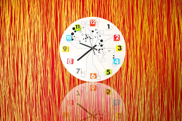 Wallpaper of red stripes and clock — Stock Photo, Image