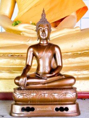 A small brown Buddha in Thiland clipart
