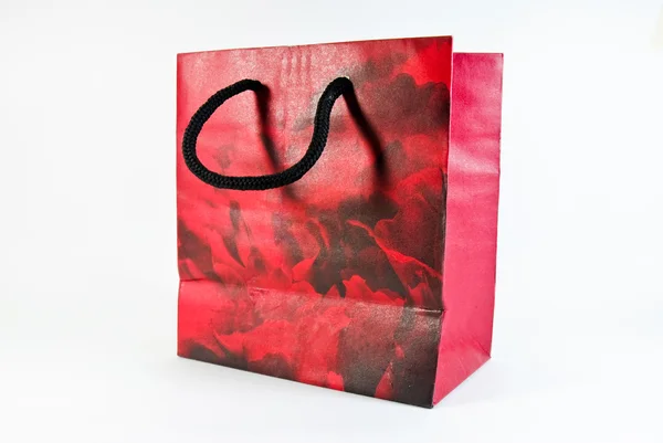 Brown paper bag with shiny gray background. — Stock Photo, Image