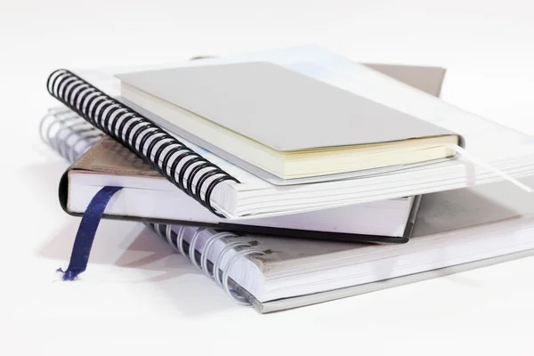 Notebook sobre um fundo branco — Fotografia de Stock