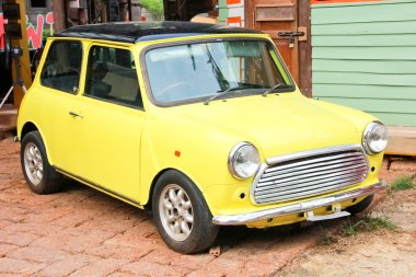 Mini Cooper in yellow clipart