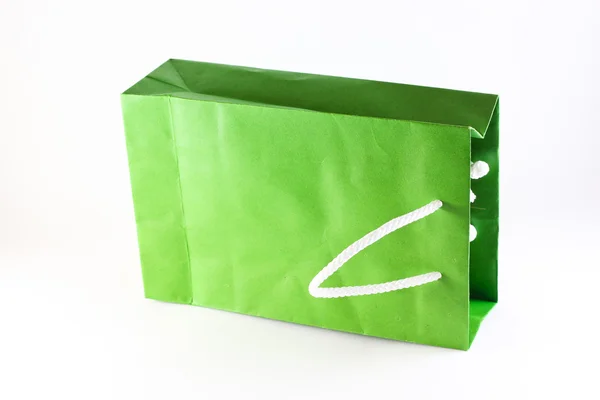 Die grüne Papiertüte — Stockfoto